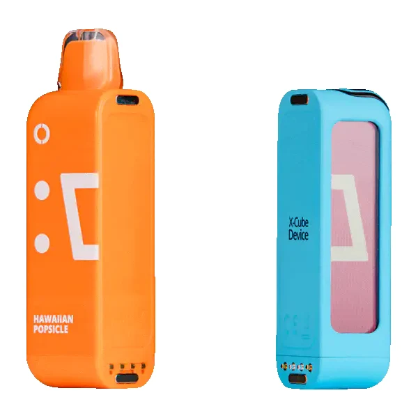 side-by-side flum white gummy devices on a wooden table